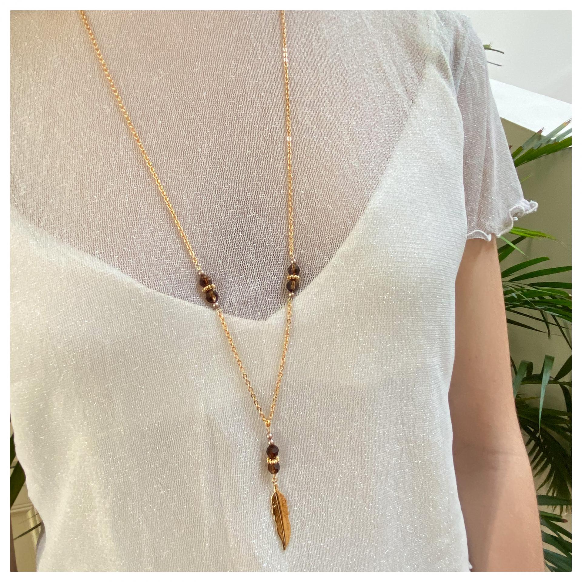 Sautoir plume et perles en cristal