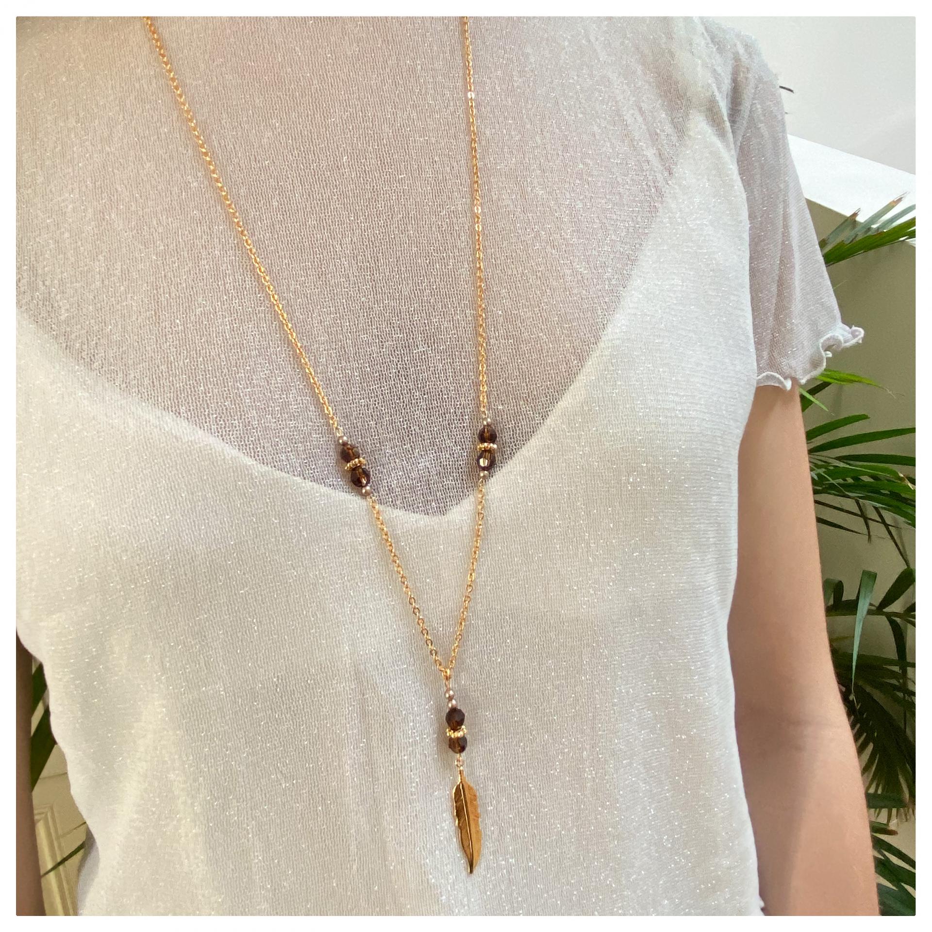 Sautoir plume et perles en cristal